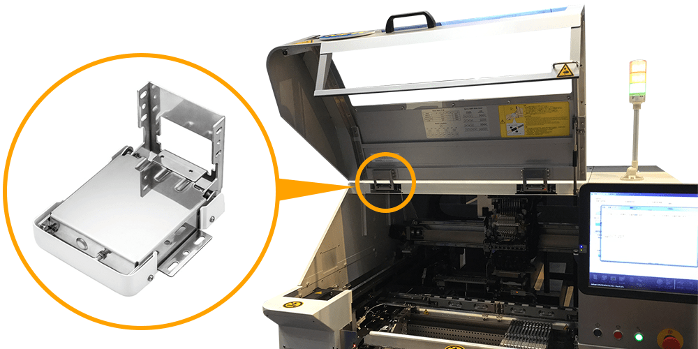 チップマウンターのカバー開閉部分に採用された事例